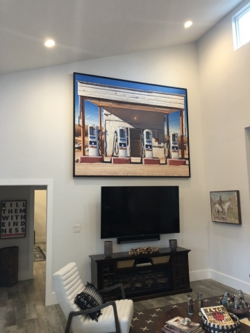 Hanging a Large Painting, Austin, Texas
